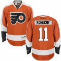 Mens Reebok Philadelphia Flyers #11 Travis Konecny Authentic Orange Home NHL Jersey